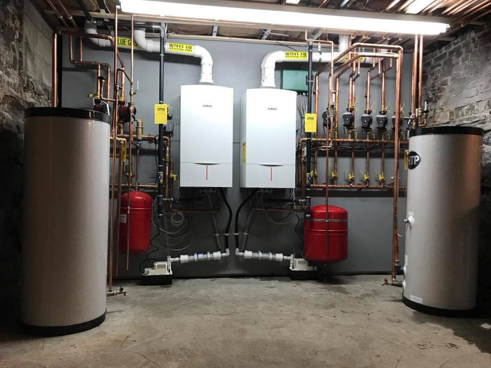 Boiler and water heater installation in a Chelmsford basement