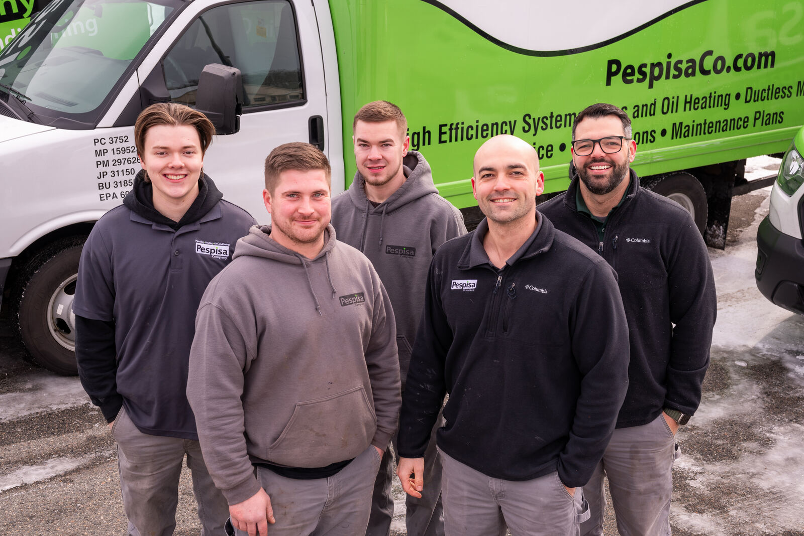 The Pespisa Company crew in front of their service vans in Chelmsford